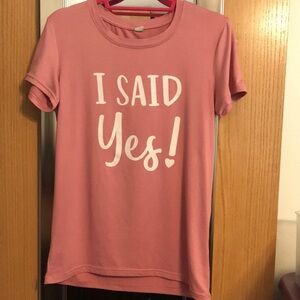 The Ring Boxes Small “I Said Yes” pink and white short sleeve tee shirt. Bride